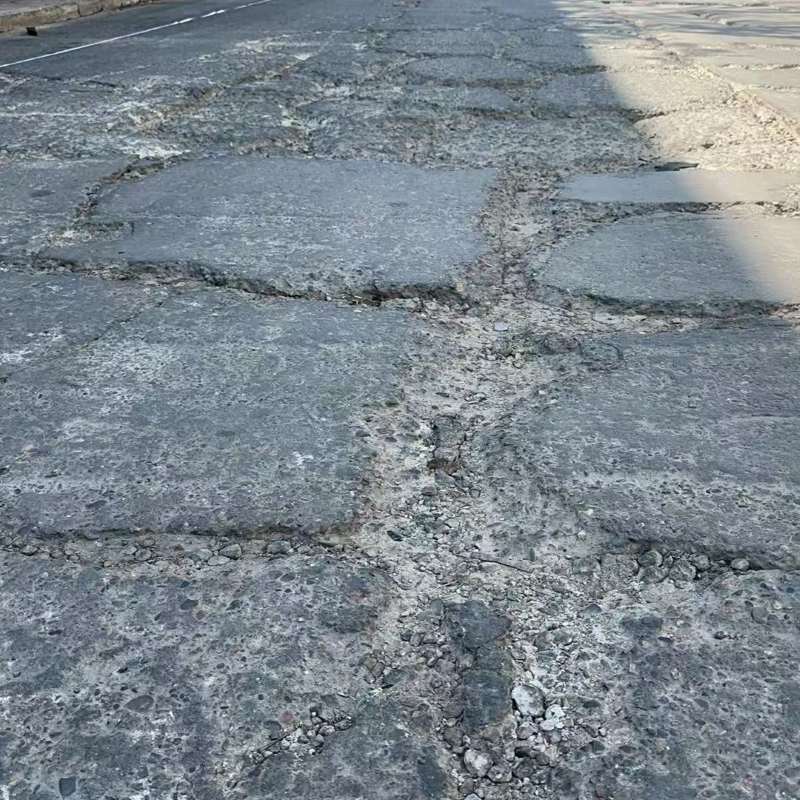 忻城路面起砂露石子修补料
